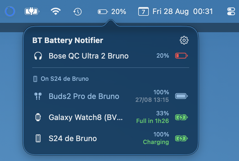 The Mac menu bar showing the headphone battery next to the clock, with the app panel open below listing the Mac’s own devices and, under a divider, the ones the phone can see